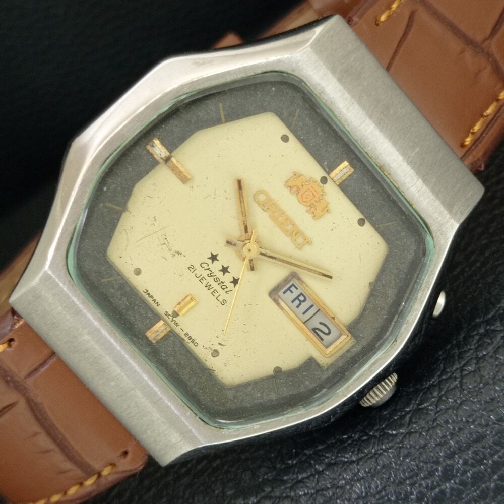 Vintage 1978 Orient Automatic Mens Silver Watch W/daydate & Gold accents